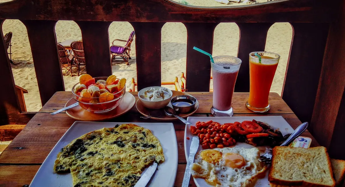 Resort in Morjim with local Local Cuisine